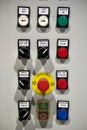 Industrial machine control panel with buttons and signals. center alarm button emergency, stop, side shift, overload, aktive