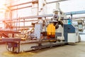 Industrial machine in the factory at metalworks. Warehouse,industrial interior, production zone. Closeup