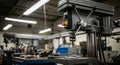 Industrial Machinery Workshop Interior Featuring Precision Drill Press Equipment with Metallic Components Under Bright Fluorescent Royalty Free Stock Photo