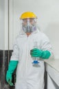 Industrial man worker in white protective overalls Royalty Free Stock Photo