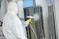 Industrial metal coating. Man in protective suit, wearing a gas Royalty Free Stock Photo