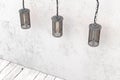 Industrial pendant lamp on a background of a rough wall