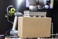 Industrial pick and place robotic or robot arm for cardboard box packing