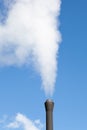 Industrial pipe polluting white steam Royalty Free Stock Photo