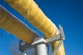 Industrial pipes with yellow thermal insulation