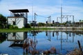 Industrial plants and waste water blue sky background Royalty Free Stock Photo