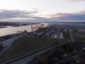 Industrial port with containers. Shipping cargo to harbor by crane in export, import business and logistics. Water transportation Royalty Free Stock Photo