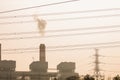 Industrial power plant with smokestack, the power plant production on hot condition in the mountain Royalty Free Stock Photo