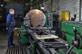 Industrial processing of metal on big turning lathe machine