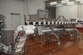 Industrial production cutting large quantities of meat.Automated line poultry equipment.Meat processing factory
