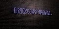 INDUSTRIAL -Realistic Neon Sign on Brick Wall background - 3D rendered royalty free stock image