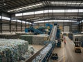 Industrial recycling facility processing plastic bottles Royalty Free Stock Photo
