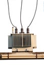 Industrial reduces power station. Power transformer on ceramic and porcelain insulators wire line