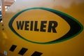 Industrial road paving machinery Weiler Yancy W430a road widener logo close up