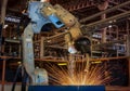 Industrial robot is movement of robot welding in factory Royalty Free Stock Photo