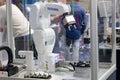 Industrial robot in tech execution, advanced automated machinery. ITM Europe, TECH EXPO. Yaskawa