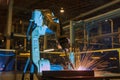 Industrial robot is test run new program in automotive factory