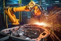 industrial robot welding an automobile part