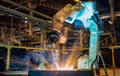 Industrial robot welding steel part