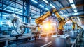 Industrial Robotic Arms Working On Production Line In Factory