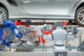 Industrial robotic teamwork working with auto parts for maintain car Royalty Free Stock Photo