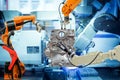 Industrial robotic teamwork working with auto parts on smart factory