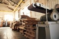 Industrial sander and wood inside of a woodworking shop