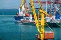 Industrial seaport infrastructure, sea, crane and ship, concept of sea cargo transportation Royalty Free Stock Photo