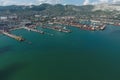 Industrial seaport, top view. Port cranes and cargo ships and barges