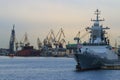 Industrial seascape with warship