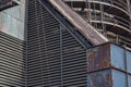 Industrial shapes and textures, louvered vents and circular catwalks Royalty Free Stock Photo