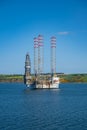 Industrial ship offshore platform wind turbine at the sea, Invergordon, Scotland, vertical shot Royalty Free Stock Photo