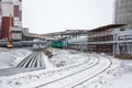 Industrial site with a railway in winter