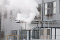 Industrial smoke from the pipe in the factory. Royalty Free Stock Photo