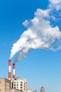 Industrial smoke stack of coal power plant in city Royalty Free Stock Photo