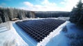 Industrial solar power farm station in winter drone view, snow on ground. Renewable energy concept
