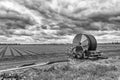 Industrial solar powered irrigator working in open countryside.