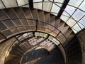 Industrial spiral staircase and glass windows