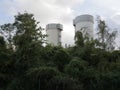 Industrial structures among green thickets