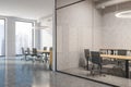 Industrial style concrete and glass meeting room Royalty Free Stock Photo