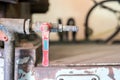 Industrial tap valve setting of old rustic machine Royalty Free Stock Photo