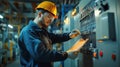 Industrial technician in safety gear inspecting control panel in factory setting, ensuring proper functioning of electrical