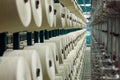 Industrial textile factory. Coils with threads in production.Fabric production . Royalty Free Stock Photo