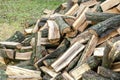 Industrial timber wood,lumber material for roofing construction. stack chopped dry trunks, Fire logs