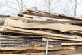 Industrial timber wood,lumber material for roofing construction. stack chopped dry trunks, Fire logs