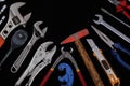 Industrial tools such as French wrenches and a variety of wrenches from a close-up in the form of color and black and white image Royalty Free Stock Photo