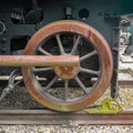 Industrial or transportation or steam punk vintage background with detail of old rusty steam locomotive Royalty Free Stock Photo