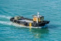 Industrial Tugboat Sailing on Blue Water Royalty Free Stock Photo