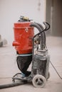 Industrial vacuum cleaner used on site attachable to the grinder Royalty Free Stock Photo