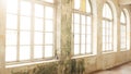 Industrial vintage interior with bright light coming through windows. Royalty Free Stock Photo